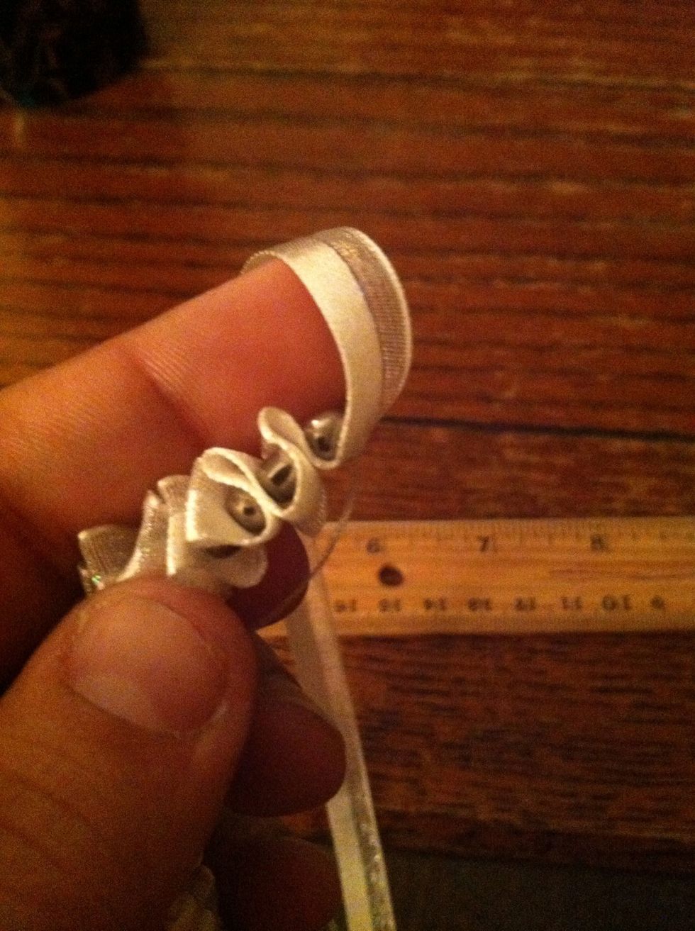 When you reach your desired length, fold the ribbon up, but don't ruffle.