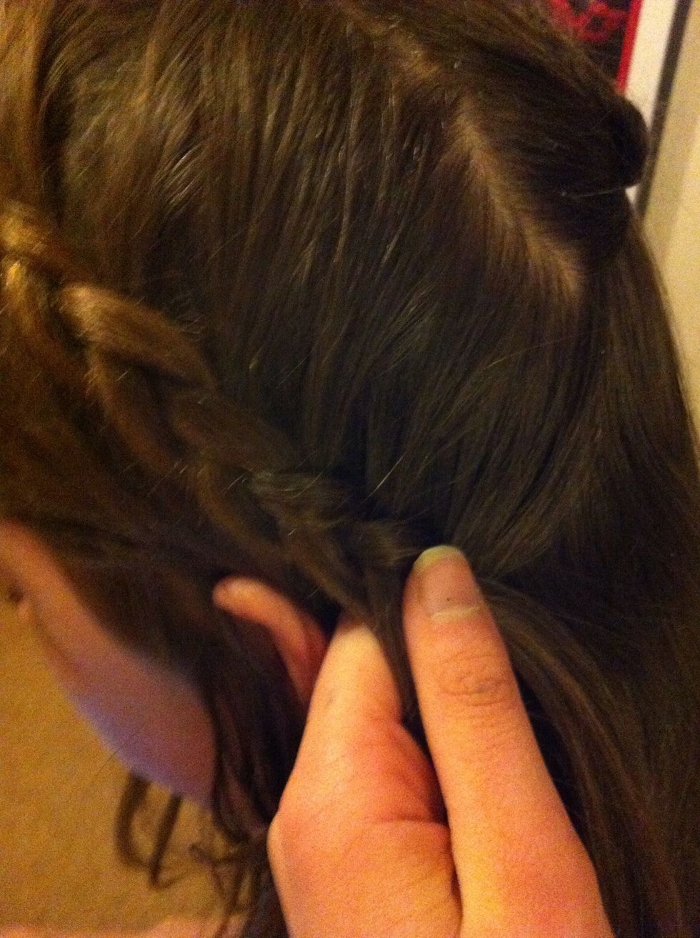 When you reach your ear, do a normal braid.