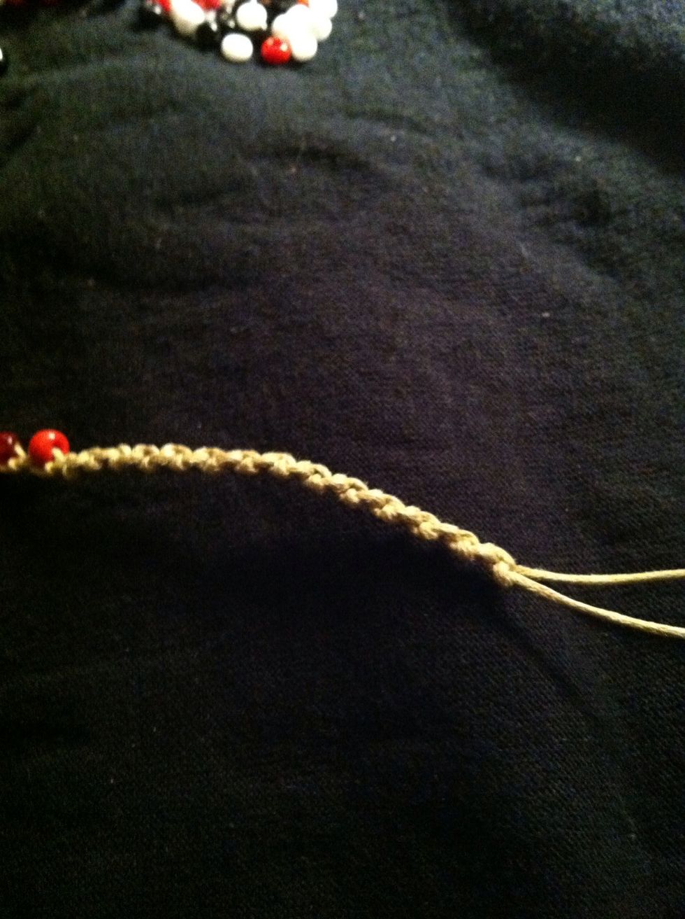 When you run out of beads, or have reached a desired bead length, continue the back and forth knotting sans beads.