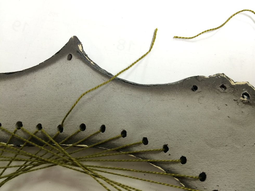 When you run out of thread, tie on a new peice so the knot is on the back side of the loom.