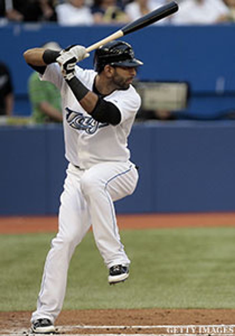 when you see the pitcher starting to wind up start to take a step as shown in the picture it doesn't have to be as big a step as in this  picture you can step as big or small as you need to time it.