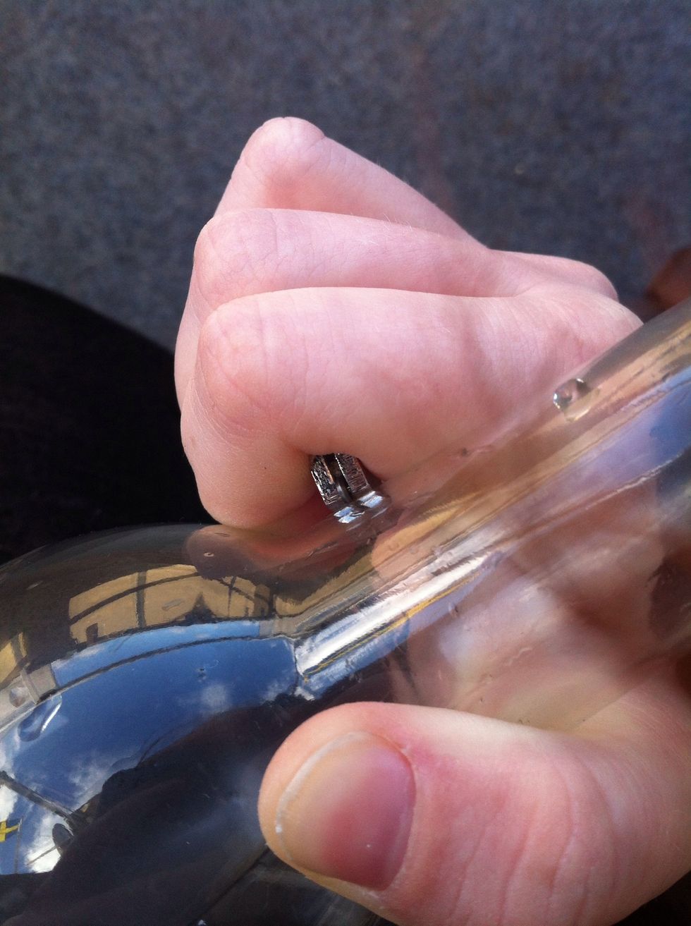 When you start to cut you need to press really hard and try to dont lift your hand on the way. Hold your hand still and rotate only the bottle. My mom helped me to rotate while i hold the cutter