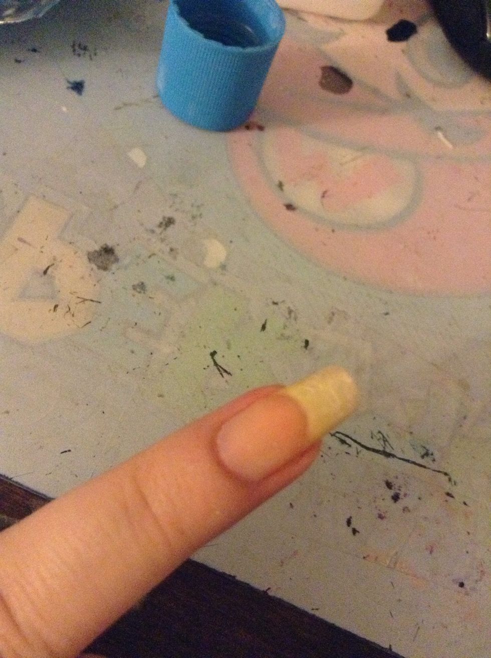 When you take the tin foil off, press it on your nail and like... Twist and rub it off your nail. It helps take off the glitter too.