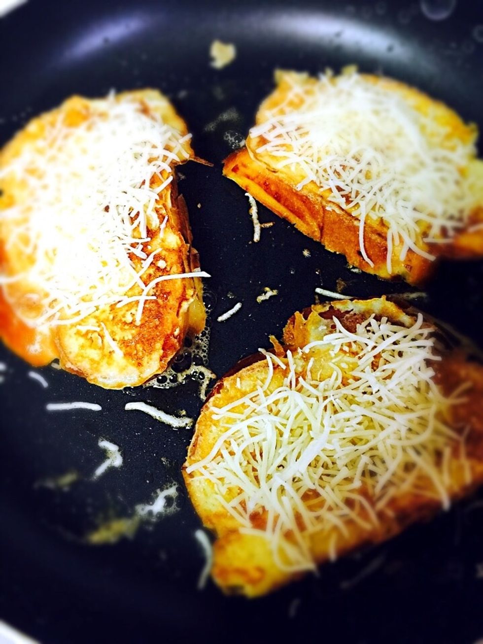 When you turn sides sprinkle with grated cheese on top and cover with lid