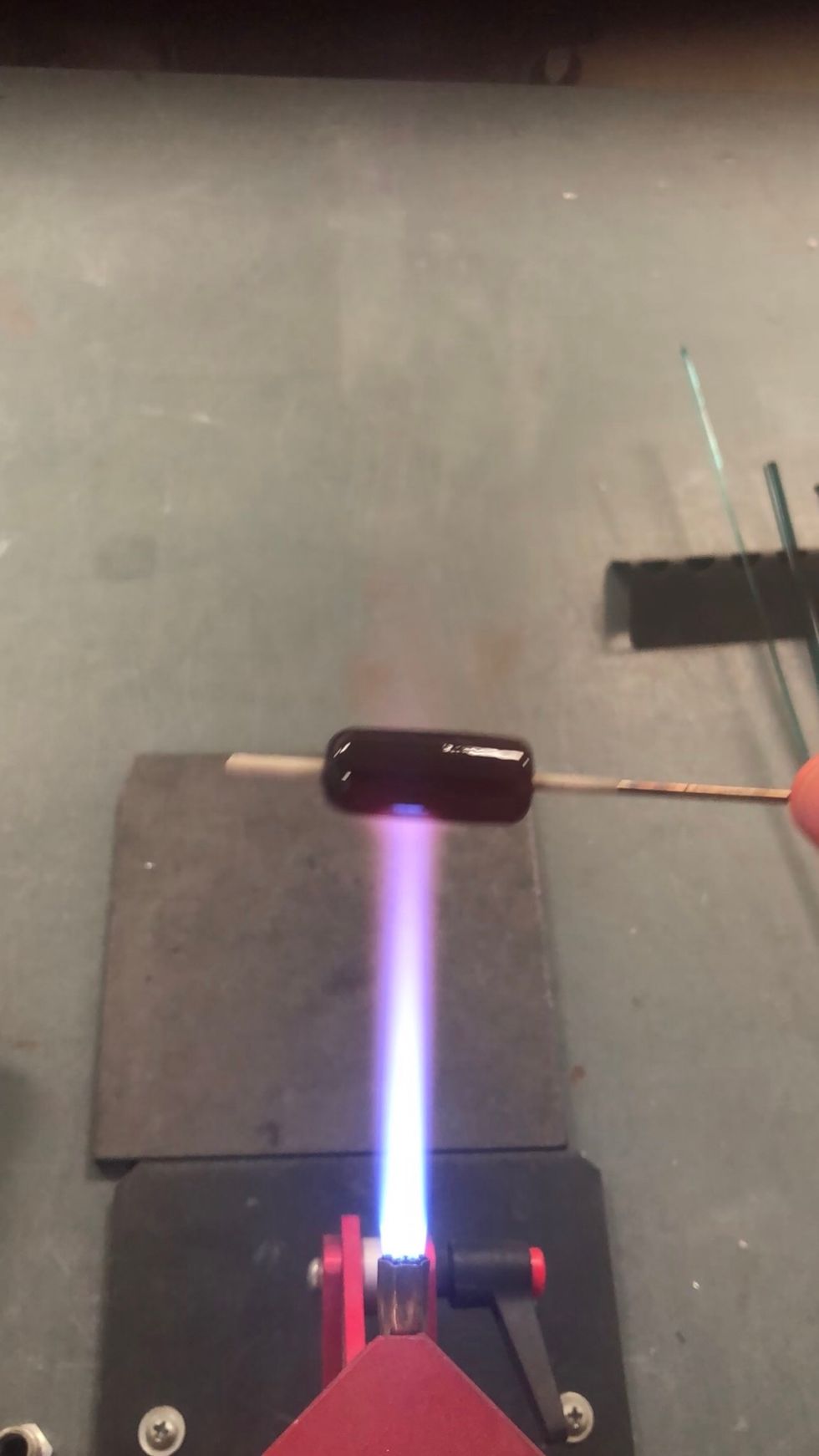 When you\u2019ve achieved the finished shape, lightly fire-polish the outside of the bead.