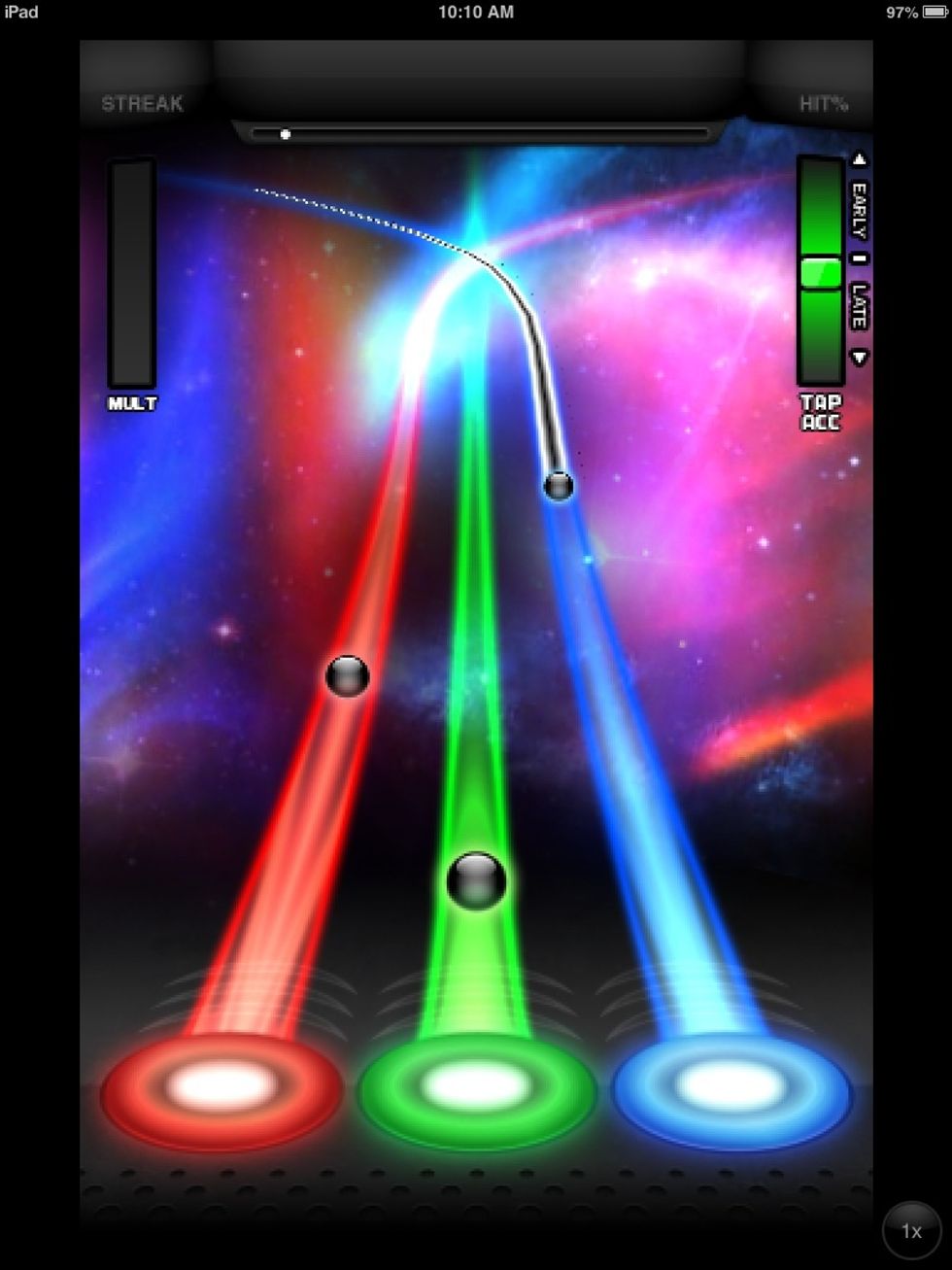 When you've chosen your song this is where it will take you and you have to click that circle at the right time it gets to the buttons and you get points on how accurate you are when you click the dot