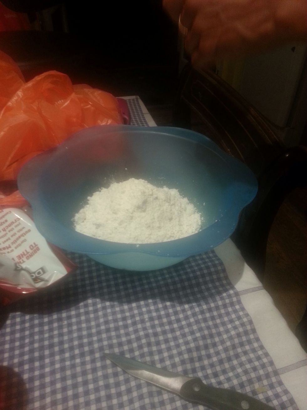 When you've grated the cheese, put the dough flour in a bowl