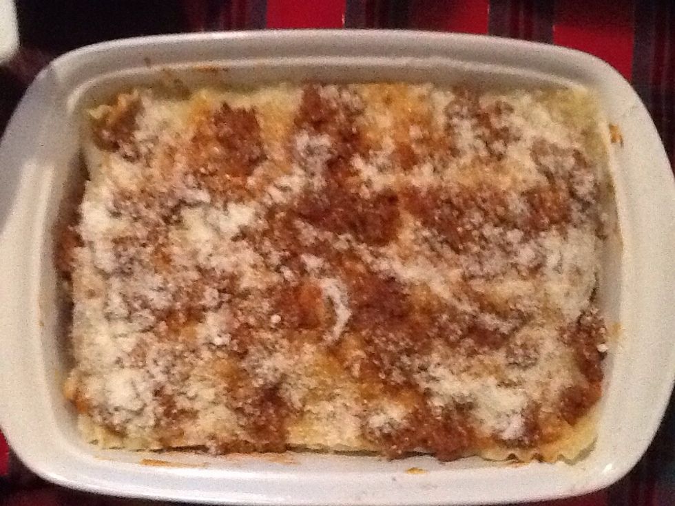 when your done adding your layers you top it off by adding a small amount of meat on top of it all and pour as much parmesan cheese as you want