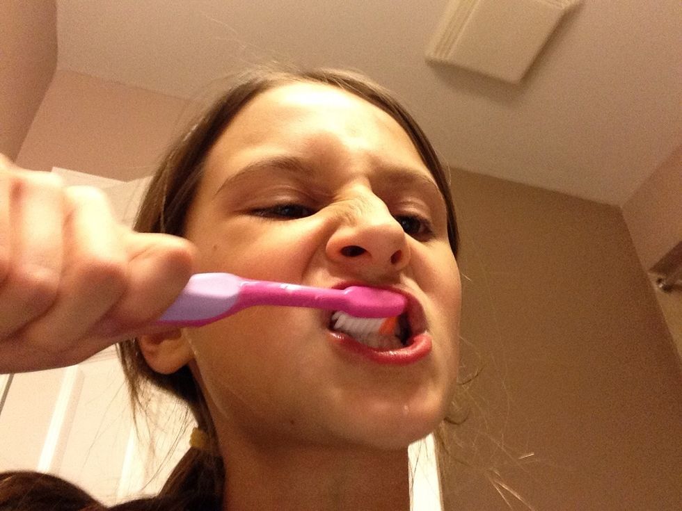 When, your done brushing your teeth grab a small cup and grab a water bottle and pour some water in the cup so lets rinsed those teeth up