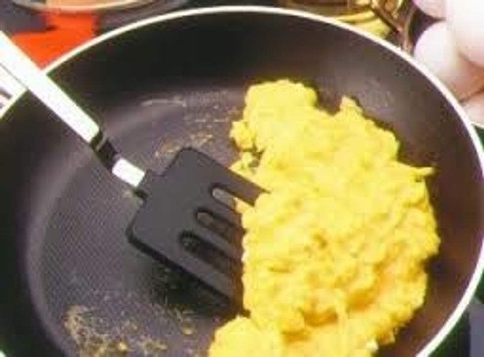 WHEN YOUR DONE MAKING TOAST THERE WILL BE LEFT OVER EGG SO YOU CAN ADD MORE EGGS IN IT AND COOK SCRAMBLED EGGS OR ANY OTHER TYPES.