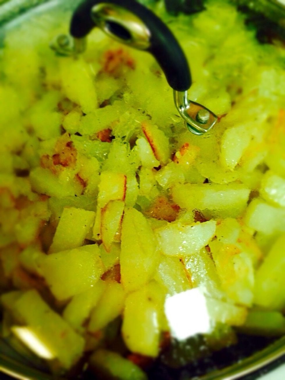 When your potato browned on almost all sides and almost soft cover the pan with lid and cook it to a complete doneness. When it's ready mix mushrooms and potatoes together and it's ready