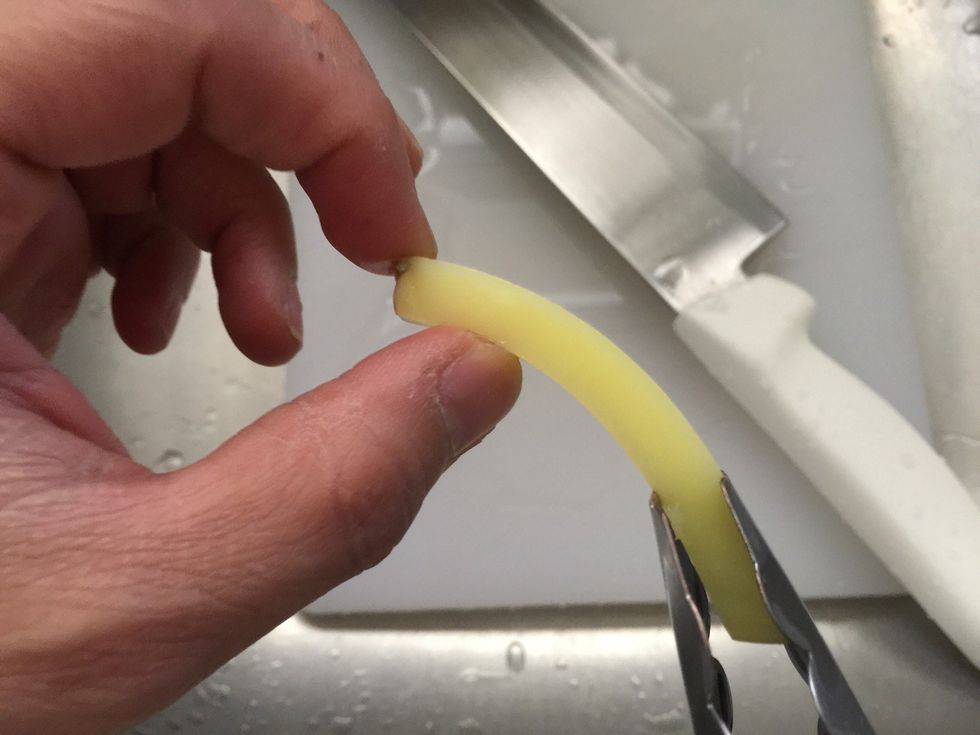 When your potatoes are done blanching, drain immediately. You want the potato to slightly bend.