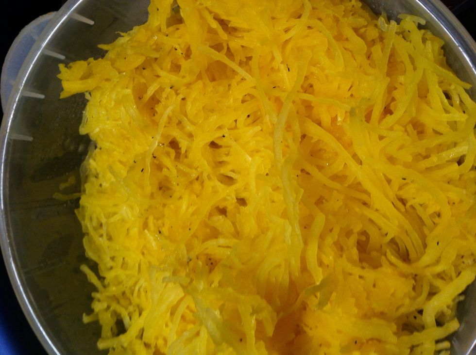 When your squash is done pull out the flesh with a fork it should all come out fairly easily all the way to the skin, looking like this . Spaghetti!