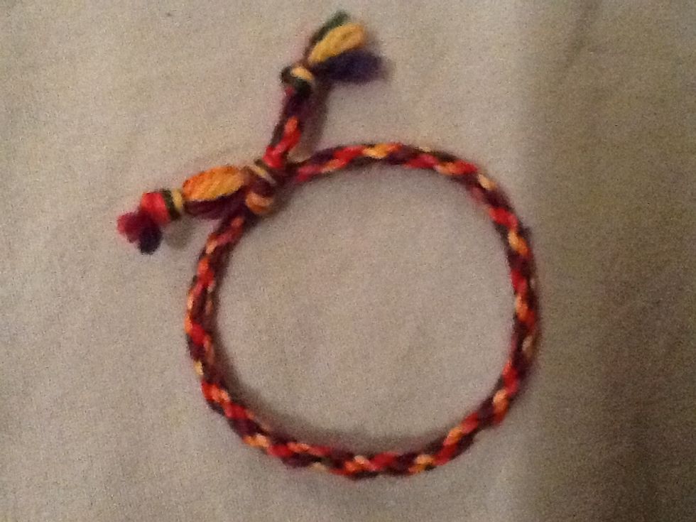 When youre done just take it ocarefully and tie a knot in the other end. And tie the ends together