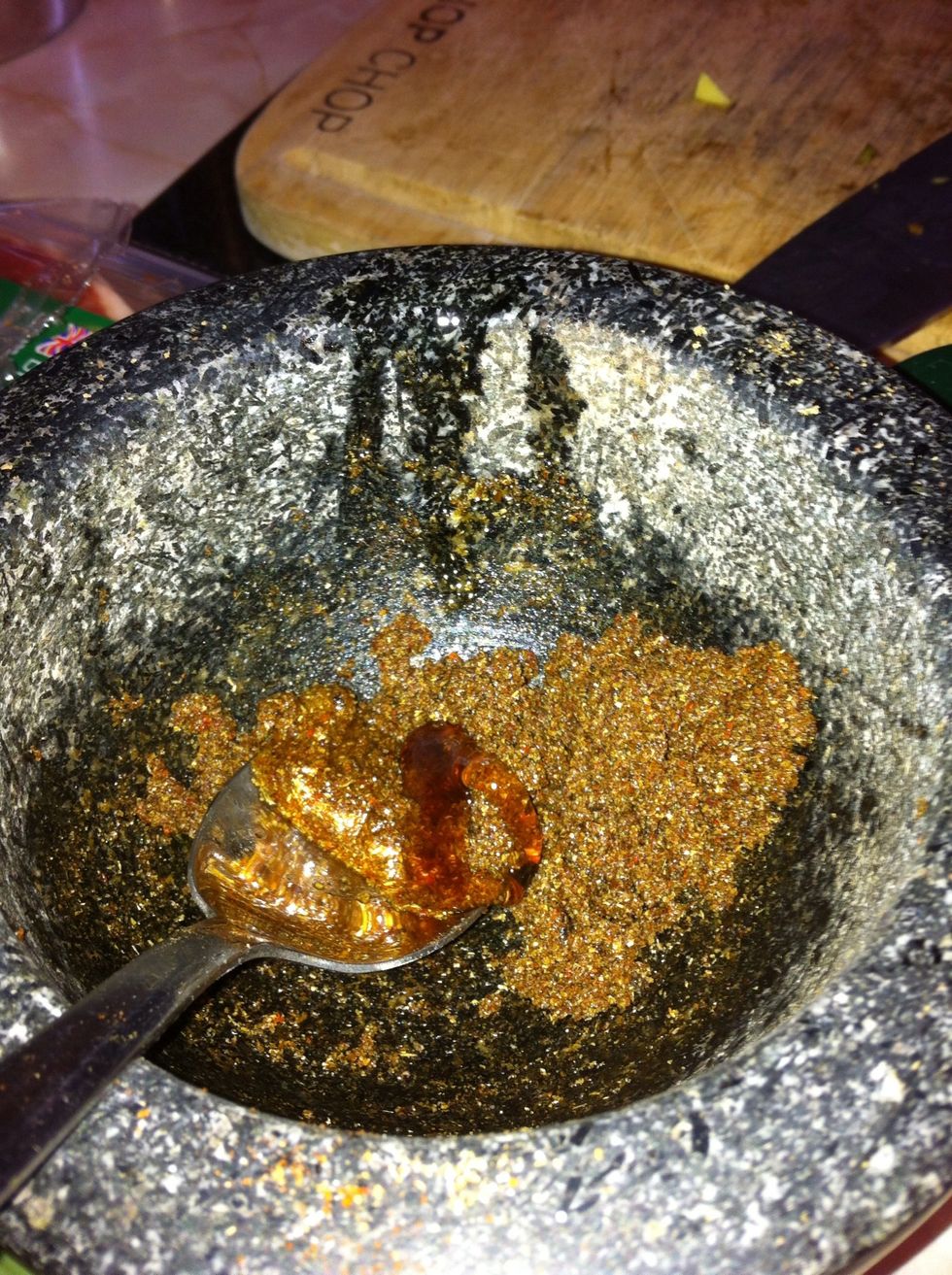 Whens its all mashed up, add some olive oil till its slippery and thick. Ive add some honey in to balance out the heat at the end.