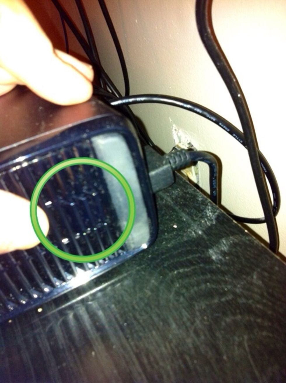 Where do we put this hard drive? On the side of your new Xbox 360, near the power cord, is a sliding button. Slide it and pull that small panel off