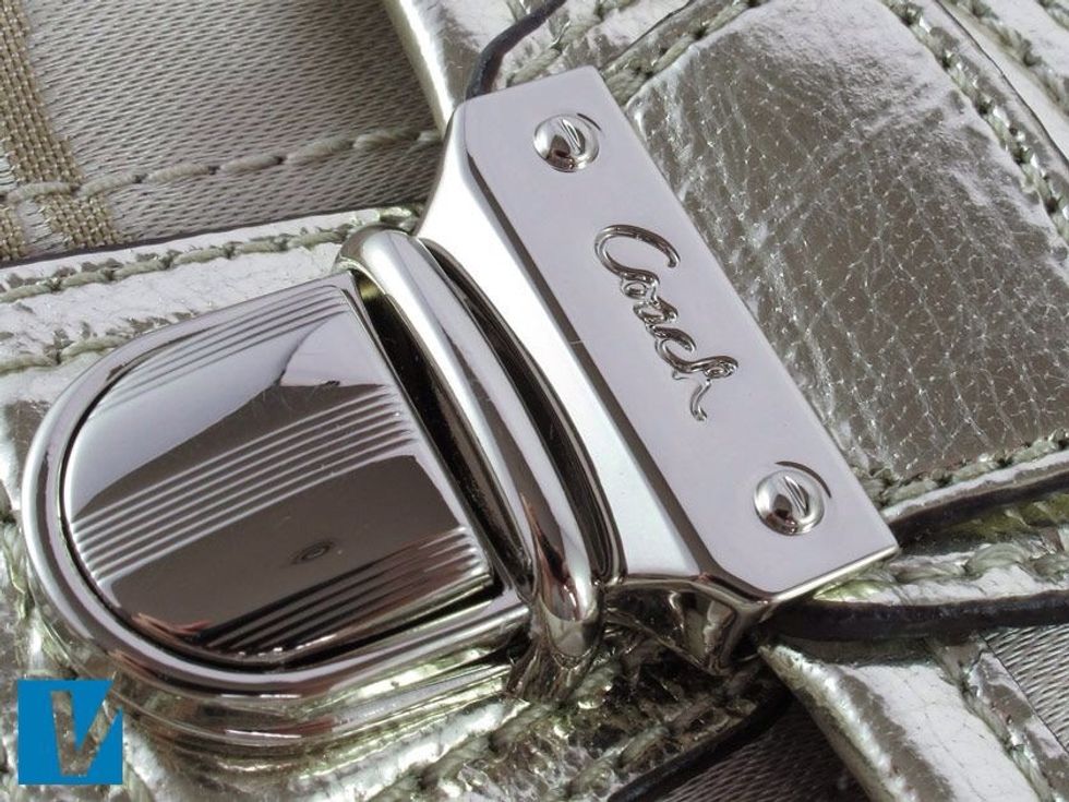 Where featured on a Coach handbag the hardware will be made of solid metal and will not flake or chip. Some pieces may be engraved and if so the engraving will be clean with a high quality finish.