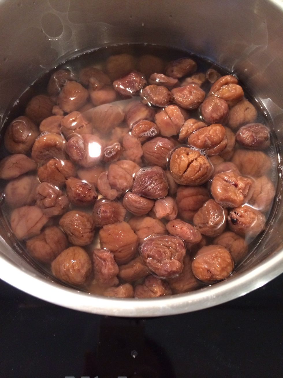 Which ever method of peeling, put the chestnuts..in a cooking pot, level with water and boil until soft.. Add boiling water if needed to boil more.