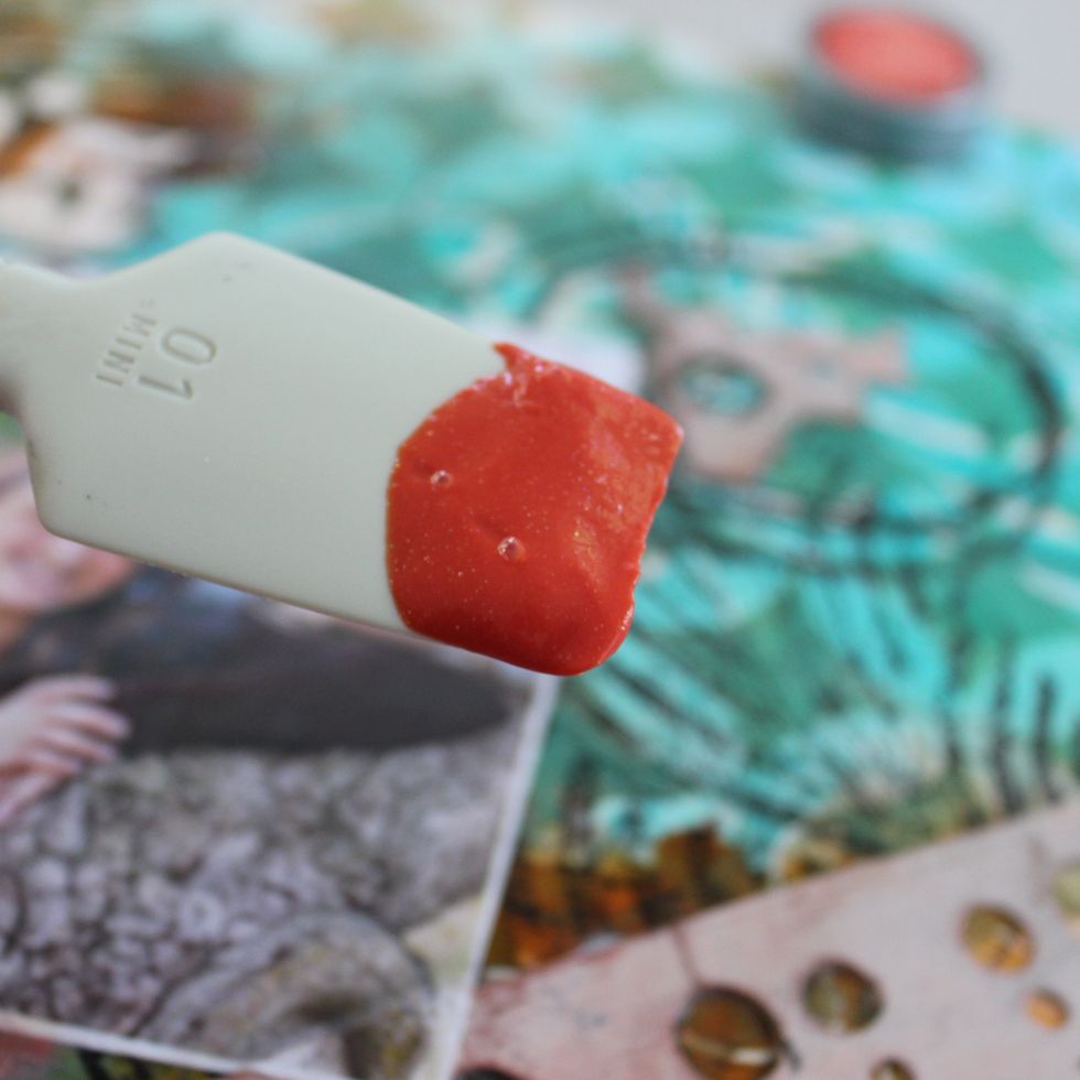 While all that other embellishments dried I looked at the layout and decided to do another layer! I used Sorbet in Coral. I put some on a Catalyst palette knife and...