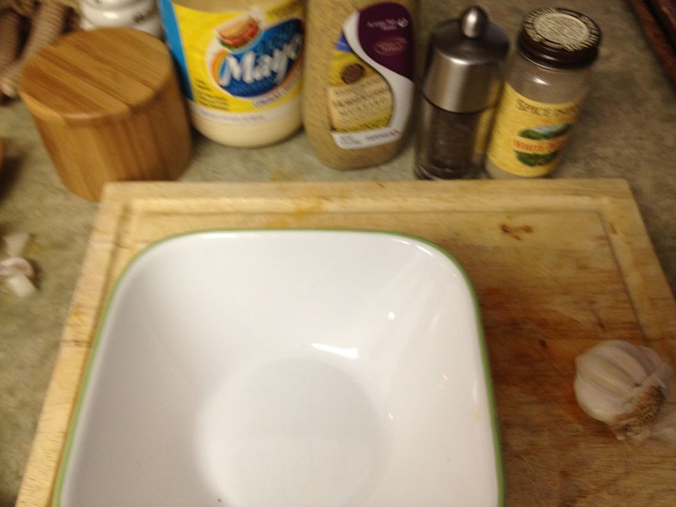 while artichokes are steaming, gather ingredients for aioli (mayo, Dijon mustard, spices, and garlic.)