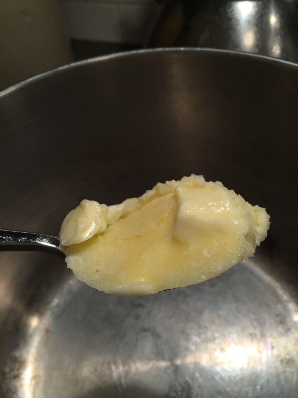 While bacon is cooking, add your butter to a large soup pot.