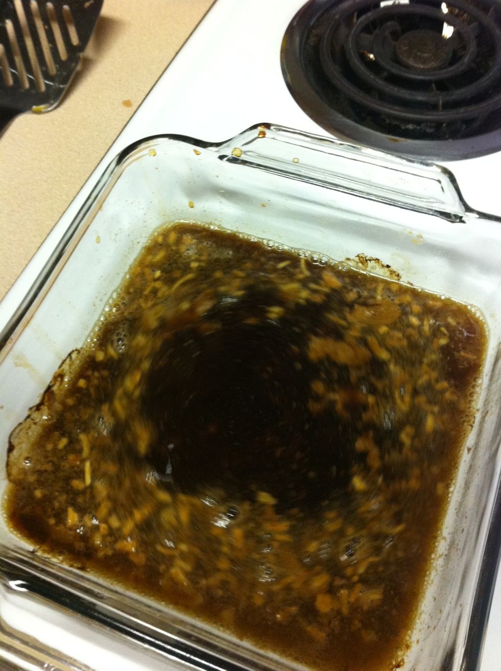 While baking dish is still very hot, deglaze by adding beer, salt and onion soup mix to the baking dish and with a large spoon scrape all the fond from the pan and whisk it all together.