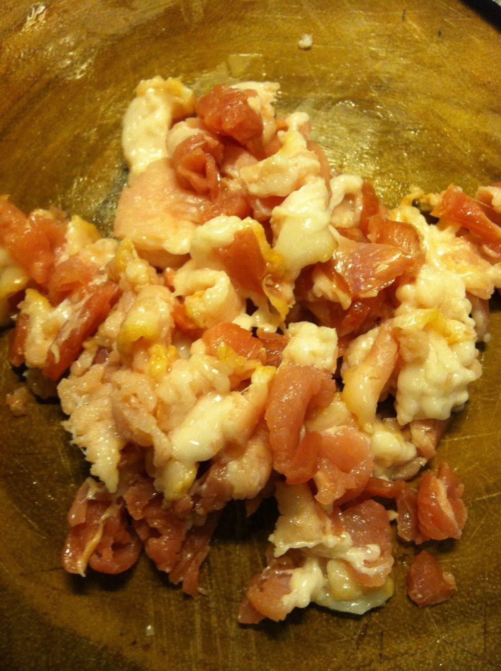 While boiling the eggs, cut the bacon into tiny pieces.