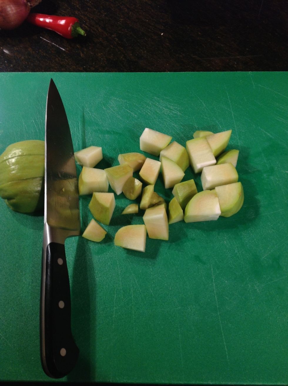 While browning meat wash a prepare chayote squash cutting into bite size pieces. Cut Patti Pan into quarters.
