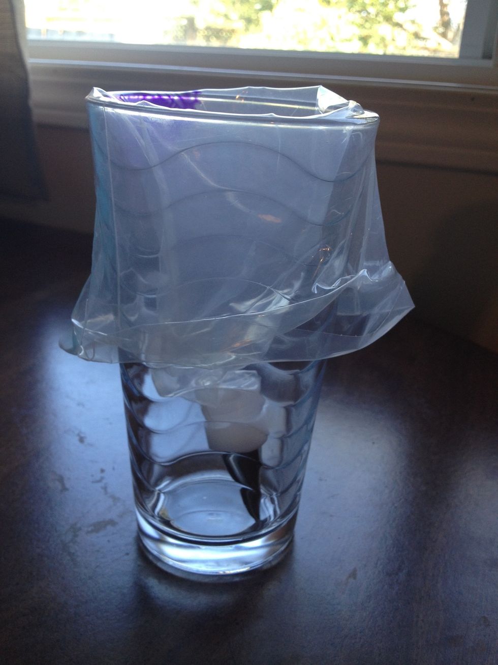 While chocolate is melting, prepare your piping bag. I put mine in a glass, it makes it much easier to put anything like the melted chocolate or frosting inside.