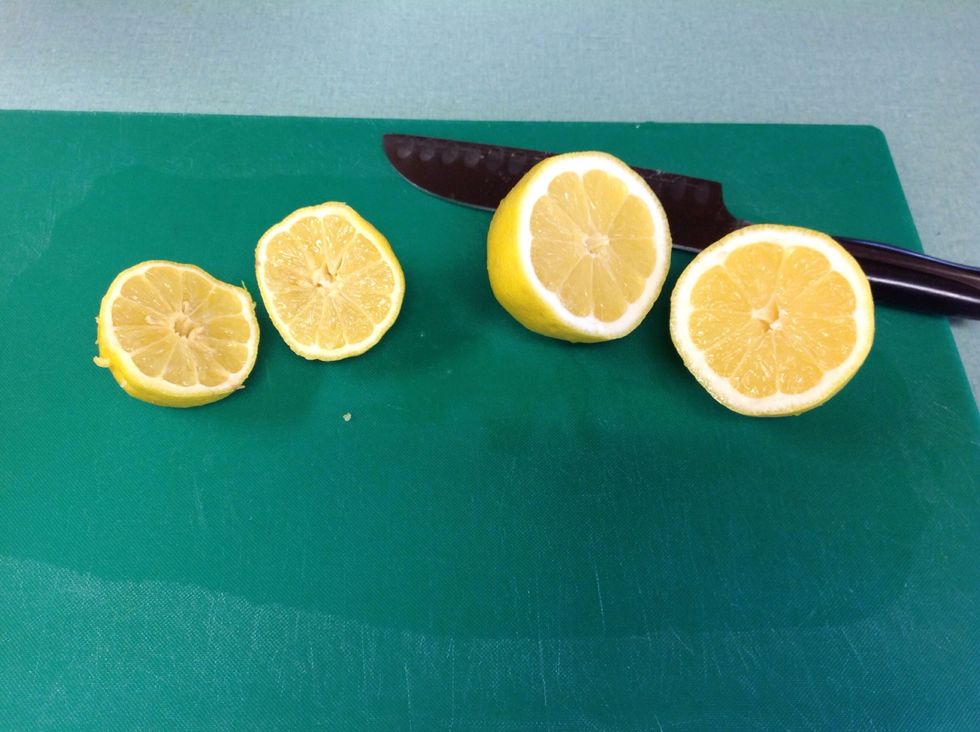 While crust is cooking, collect 2 lemons and cut them in half to be juiced