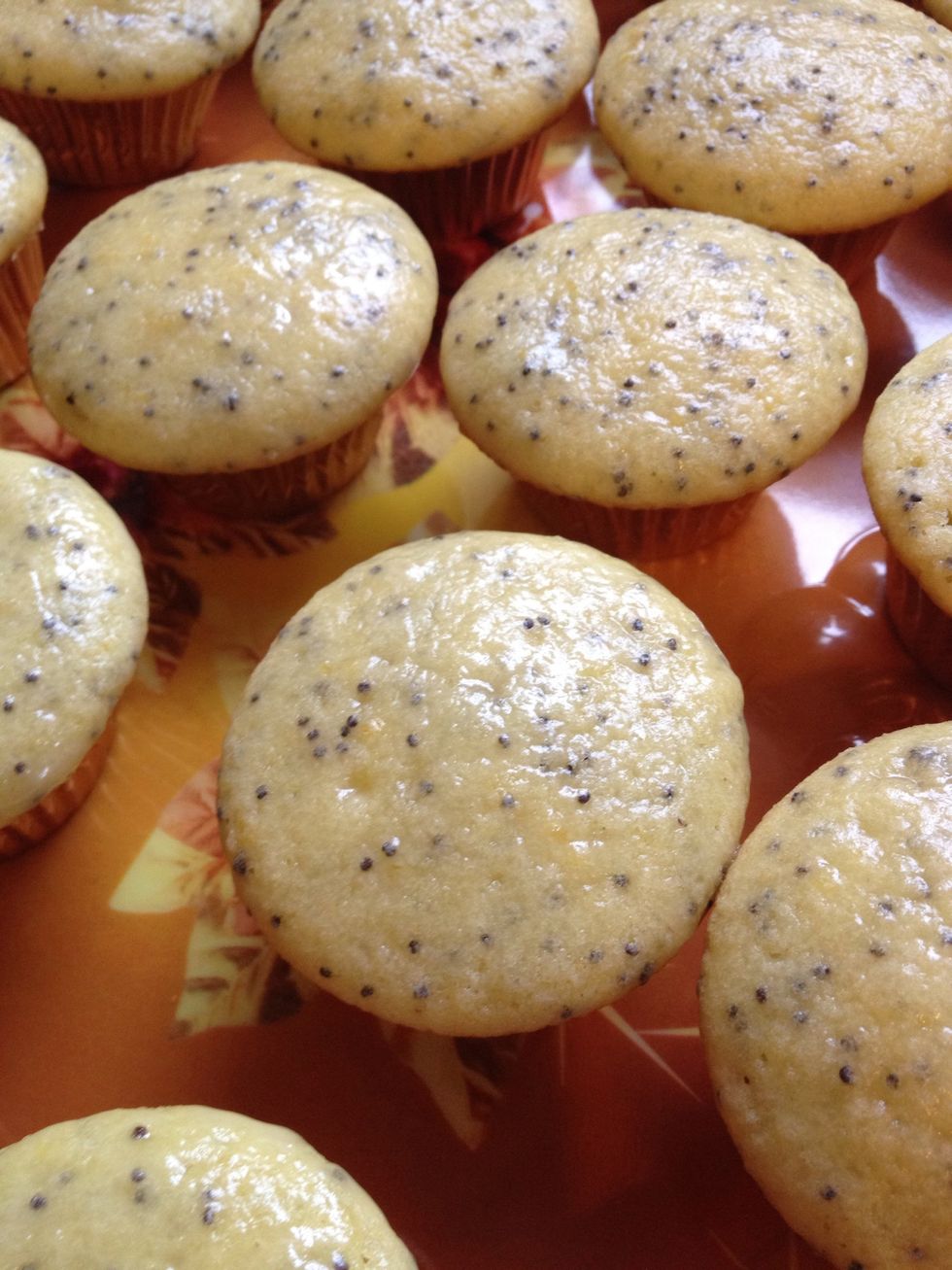 While cupcakes/cake is still warm brush glaze over cupcake/cake.