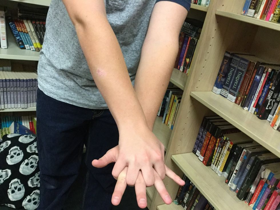 While doing compression, extend your arms, lock fingers like so,and push down with power from your legs. * You will break their ribs, but remember you are saving their life
