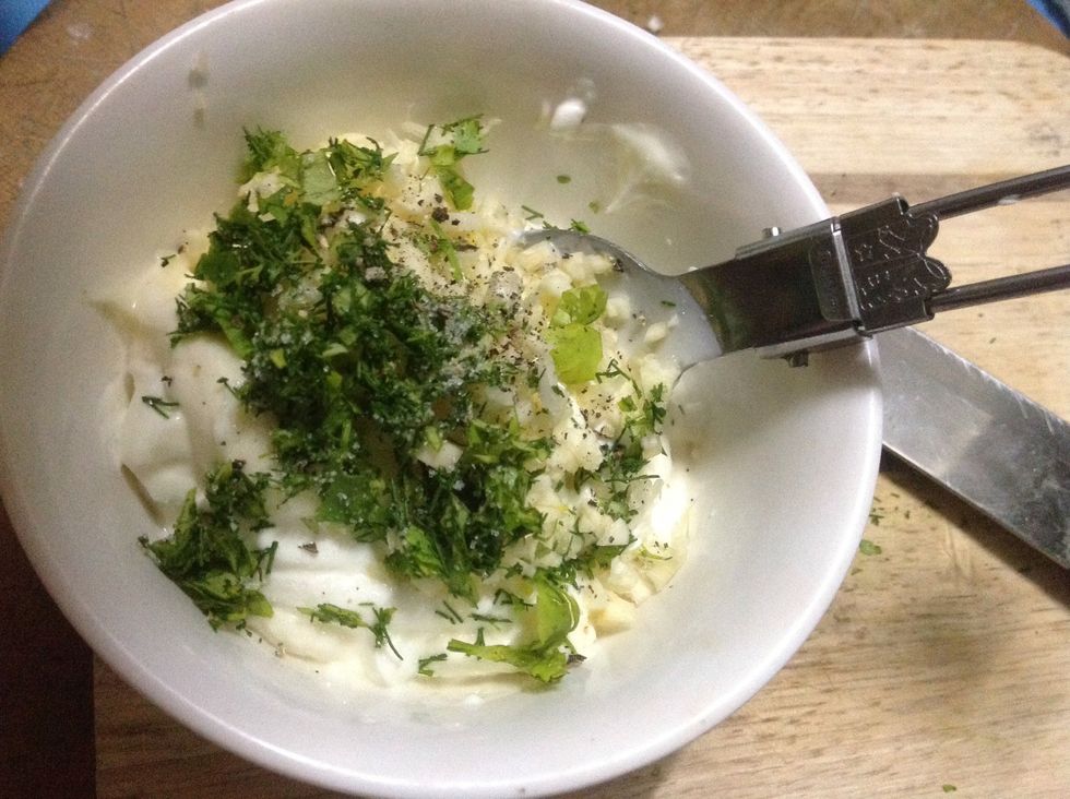 While dumplings being cooked you can prepare some easy tasty sauces. I use sour cream mixed with mayonnaise, add some crushed garlic, salt, dill and fresh coriander.