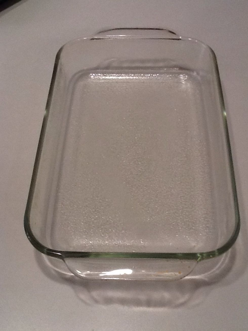 While eggplant is baking, coat an 11x7 baking dish with cooking spray.