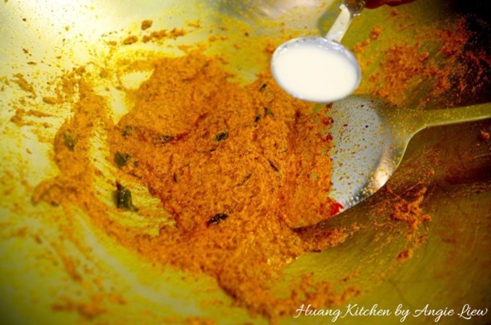 While frying, stir in 3 tablespoons of the thick coconut milk. Continue to stir fry for a while, about 3 minutes.