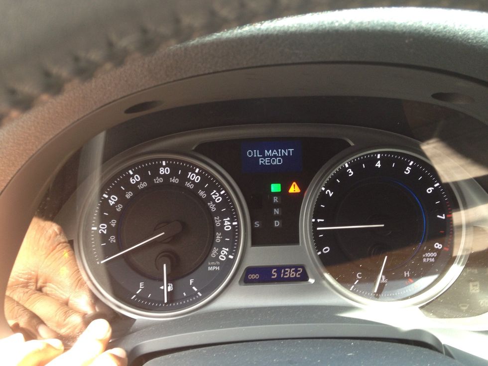 While holding the odometer button down, press the start button once, then while still holding, press start again to start the car