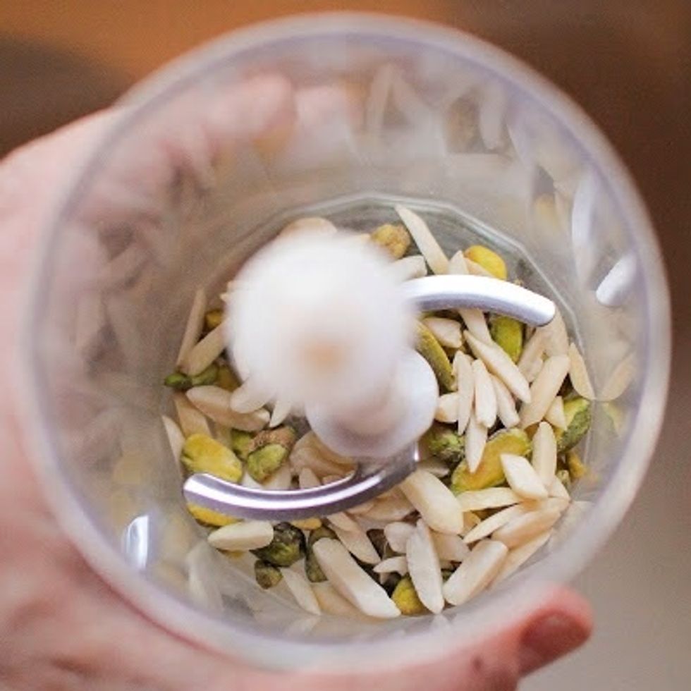 While it's cooking, chop the pistachios and almonds and set them aside.