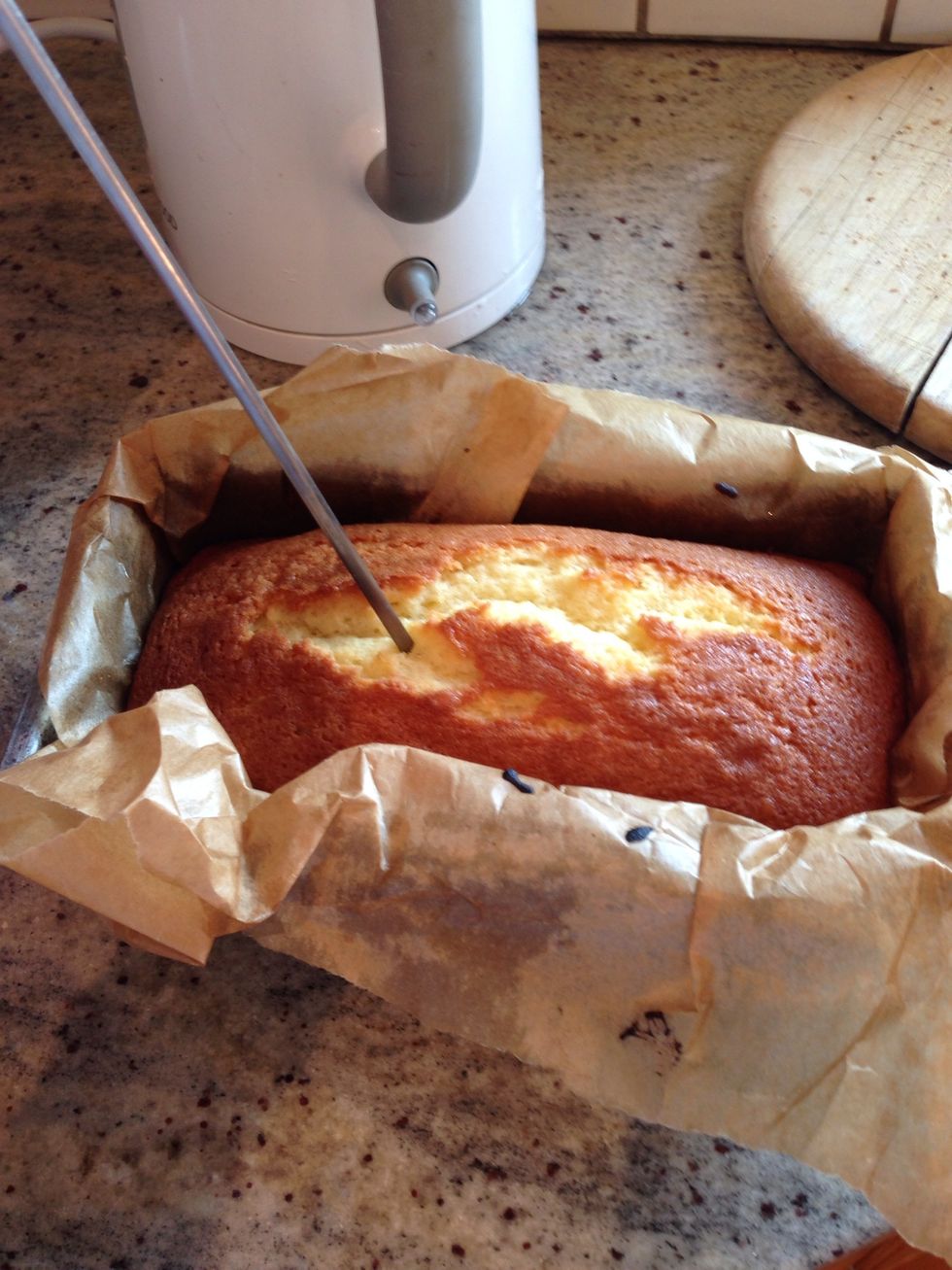 While it's still hot use a cake tester or skewer to poke little holes all the way down into the sponge for the syrup to sink into.