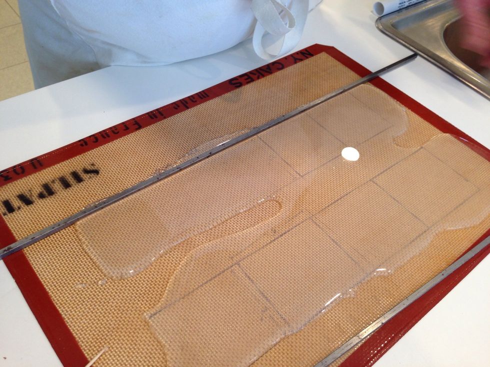 While it was still hot, we put the bars down to form the edges.