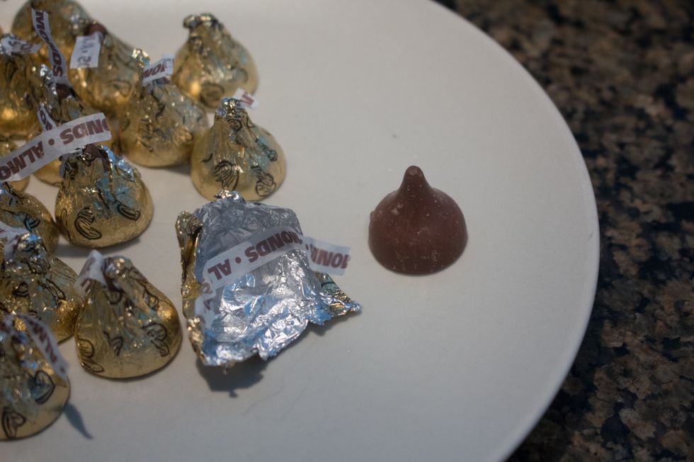 While its baking, unwrap all of your hershey kiss chocolates!