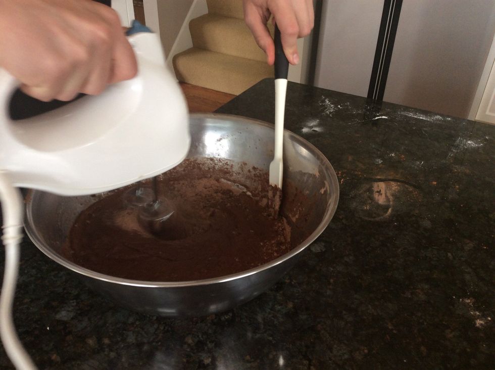 While mixing, continuously scrape the sides of the bowl to mix in any unmixed clumps or dry ingredients.