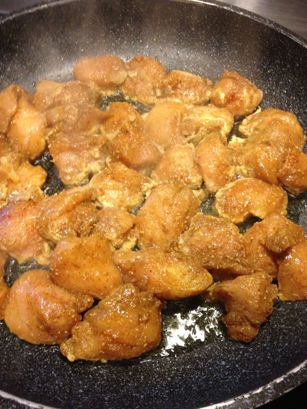 While rice is boiling. Add oil and stir fry chicken
