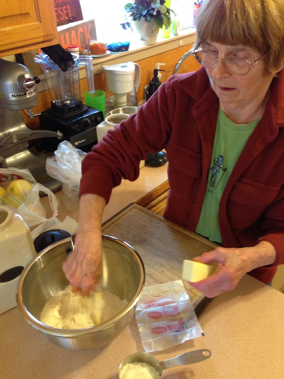 While slicing the butter & margarine make sure to swirl them around into the flour so they don't stick to each other.