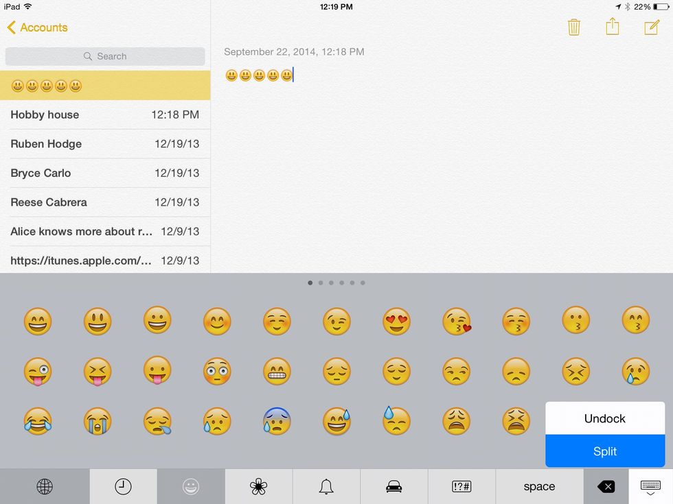 While still holding the keyboard button move your finger up to the split button.
