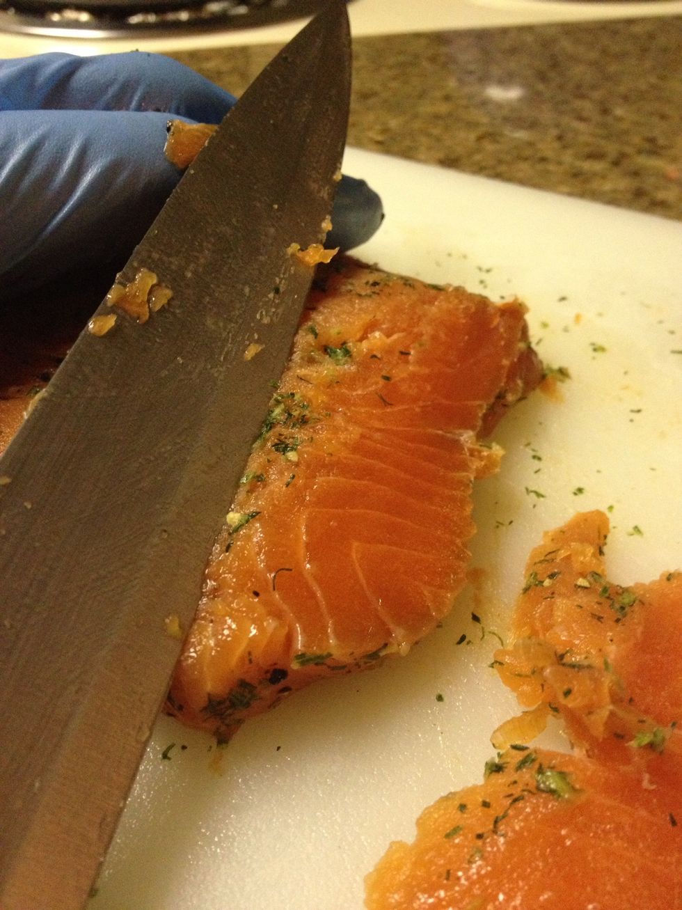 While stone preheats prep toppings. Thin slice salmon gravlax (check my guide) you can also substitute lox or smoked salmon..