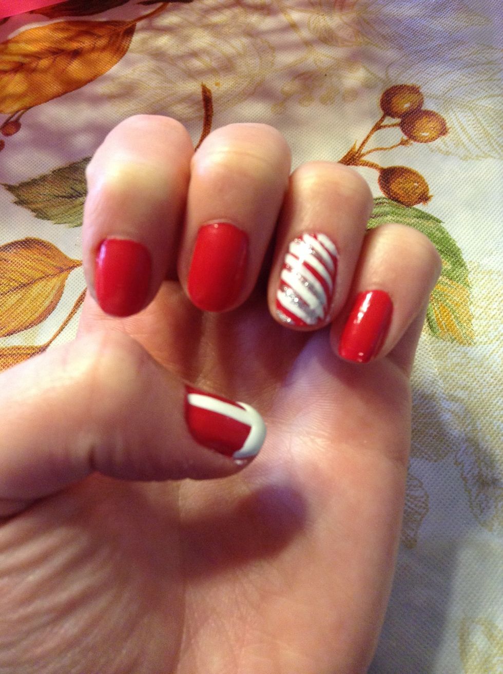 While that drys paint horizontal lines on your glam nail!! (Sorry I don't have pictures it was to hard to film by myself.)