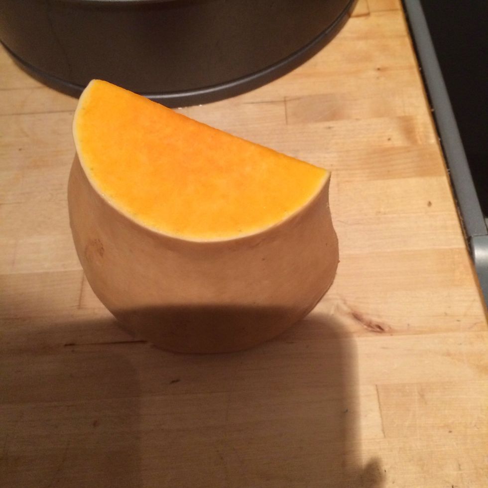 While that's whisking. Use half a butternut squash and peel the skin off and scoop out the seeds