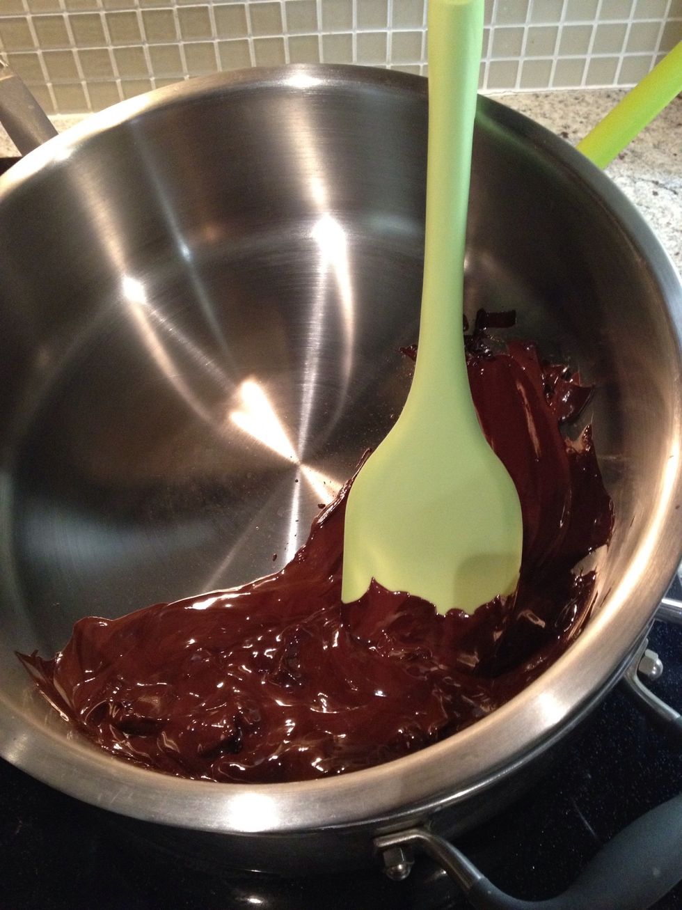 While the balls are freezing, melt the remaining 4 ounces of chocolate. This will be used for the final coat on the cake balls and should be in a pot that is deep enough to allow dipping.