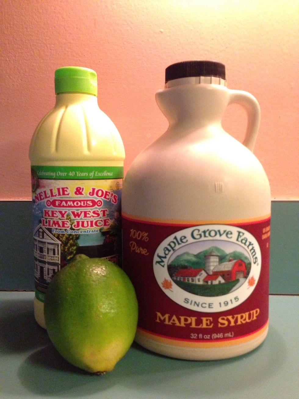 While the bird is cooking, prepare a finishing sauce by combining maple syrup, key lime juice, and zest from one lime in a small dish.