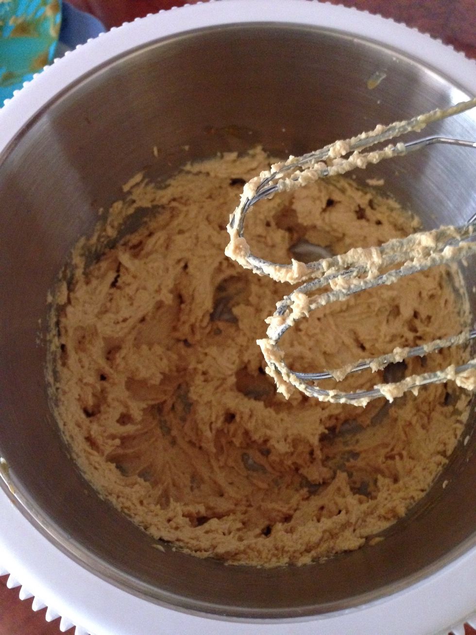 While the biscuit is cooling lets make the frosting. Mix the softened butter and caramel very well.